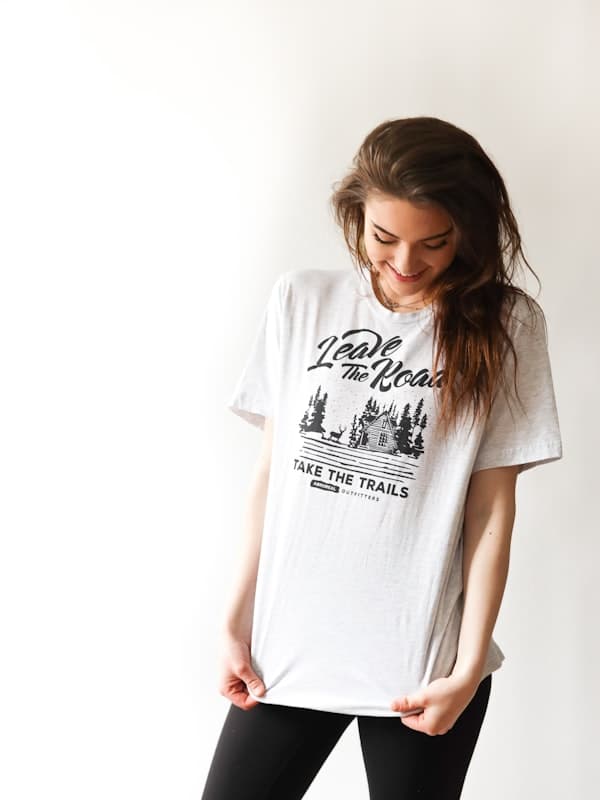 A woman in a white printed graphic cotton t-shirt